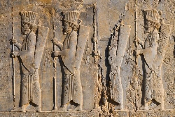 Carved relief of four Royal Persian Guards, facade of Private Palace of Darius the Great (Tachara)