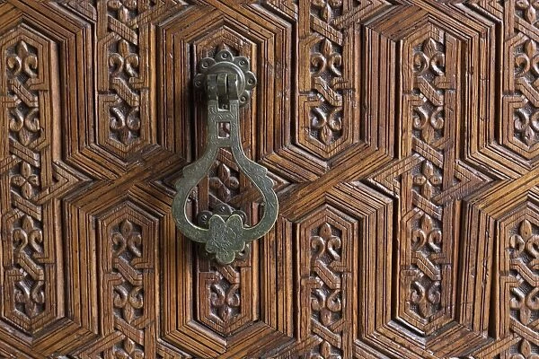 Detail of a carved wooden door in the Musee de Marrakech, Marrakech, Morocco, North Africa, Africa