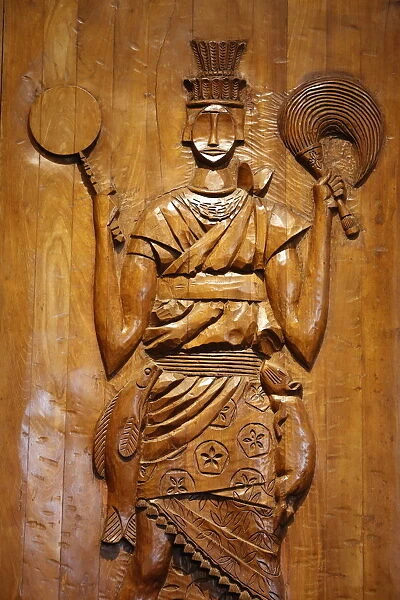 Carved wooden relief depicting Candomble (Afro-Brazilian religion