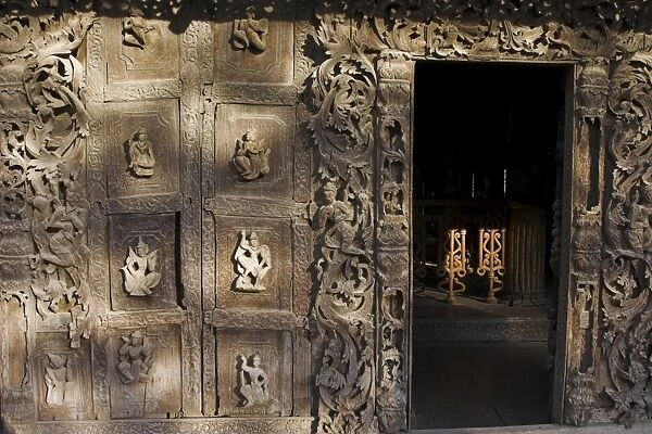 Carvings on traditional wooden monastery, once part of the Royal Palace complex