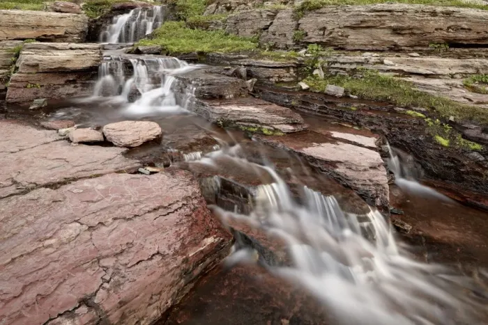 Framed Print : Cascades over red rock, Glacier National Park, Montana, United States of America, North America Framed Print : Cascades over red rock, Glacier National Park, Montana, United States of America, North America