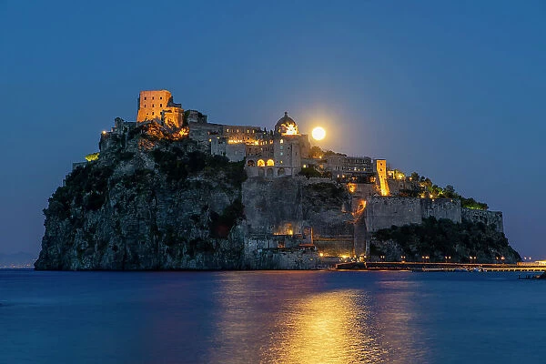Castello Aragonese at dusk, Island of Ischia, Campania, Italy, Europe