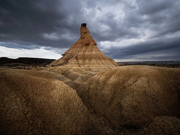 Castildetierra rock formation under a cloudy sky, the symbol of badlands of Bardenas Reales desert, Navarre, Spain, Europe