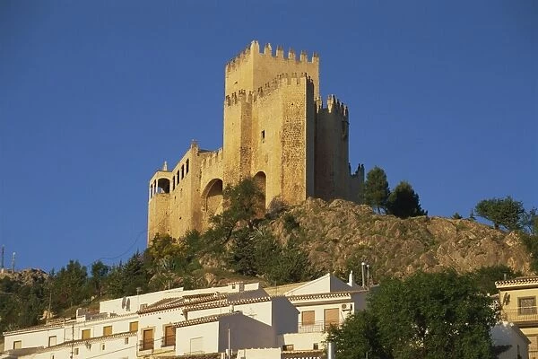 Castillo de los Fajardo towering above whitewashed village houses