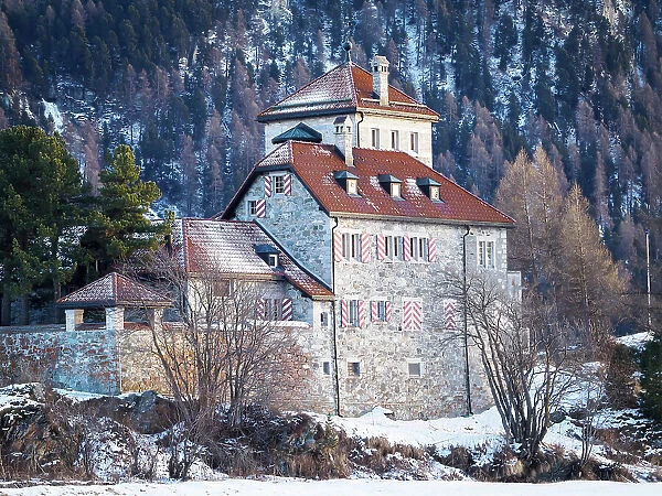 A castle-like early 20th-century house by Lake Silvaplana, Switzerland, Europe