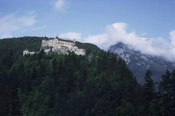 Castle in pine covered mountains near Salzburg, Austria, Europe