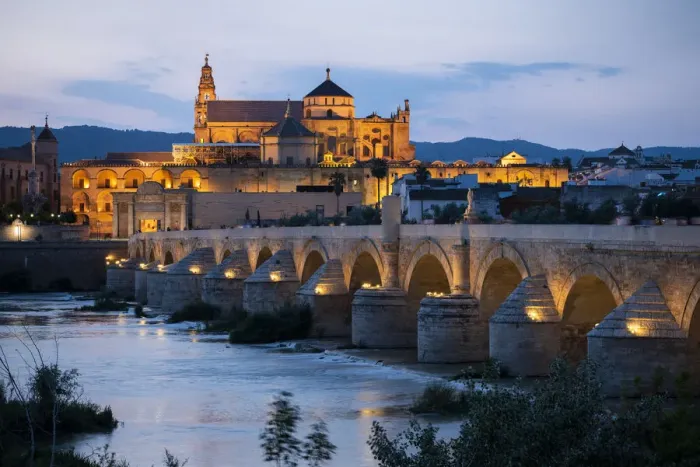 Framed Print : The Cathedral and Great Mosque of Cordoba (Mezquita) and Roman Bridge at twilight Framed Print : The Cathedral and Great Mosque of Cordoba (Mezquita) and Roman Bridge at twilight