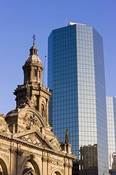 Cathedral Metropolitana and modern office building in Plaza de Armas, Santiago