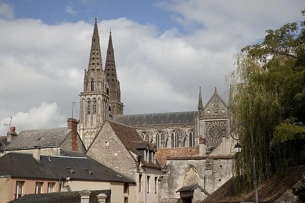 Cathedral spires seen over old houses, Sees, Lower Normandy, France, Europe