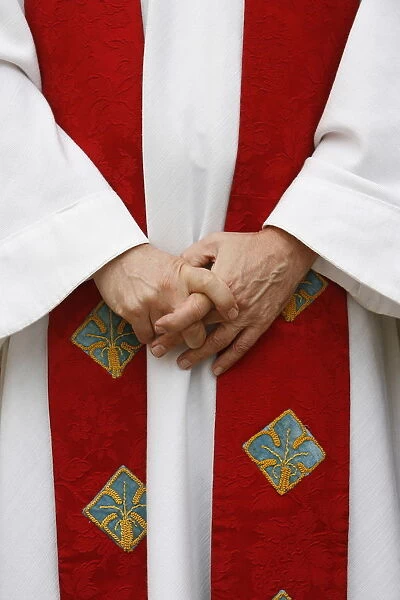 Catholic priest dressed for mass, Pontigny, Yonne, France, Europe