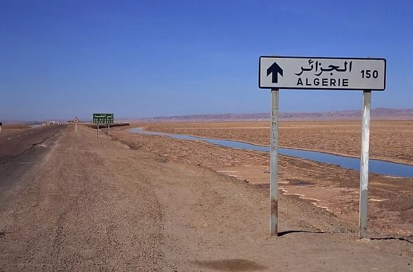 Causeway over salt flats, Chott El Jerid, Tunisia, North Africa, Africa