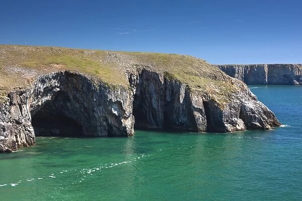 Caves at Raming Hole, looking towards Stackpole Head, Pembrokeshire, Wales, United Kingdom, Europe