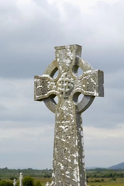Celtic style cross in graveyard
