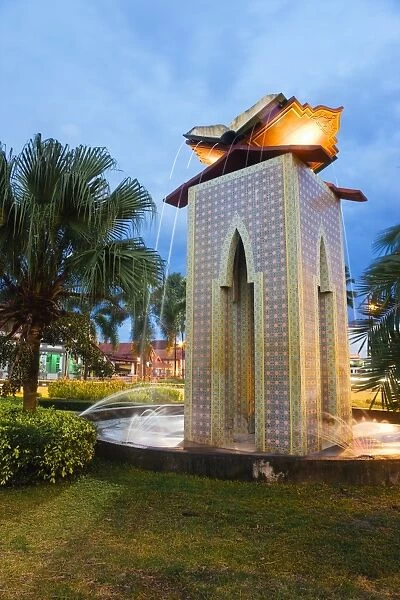Central park and museum Negeri Kelantan (State Museum) illuminated at dusk, Kota Bharu, Kelantan State, Malaysia, Southeast Asia, Asia