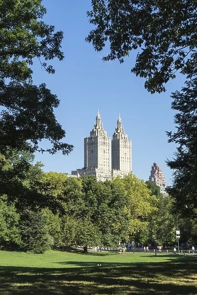 Central Park with the San Remo Building beyond the trees, Manhattan, New York City, New York, United States of America, North America