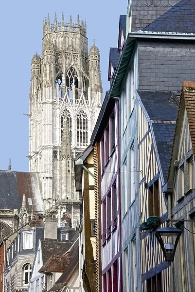 Detail of Central Tower of Saint Maclou church dating from the 15th century, and half timbered houses, Rouen, Upper Normandy, France, Europe