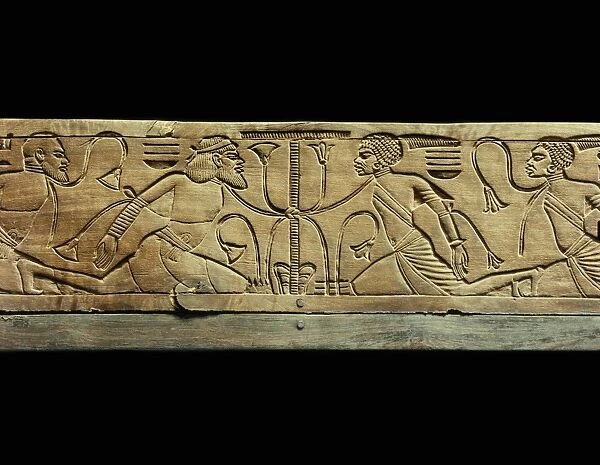 Detail from the ceremonial footstool of the king showing the enemies of Egypt conquered