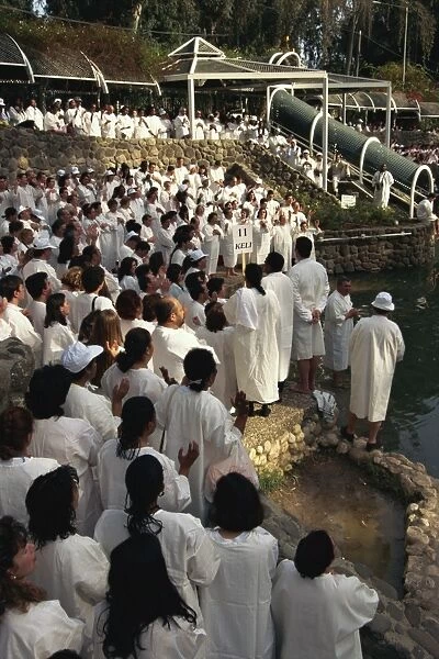 Ceremony of mass baptism into Christianity in the Sea of Galilee at Yardent
