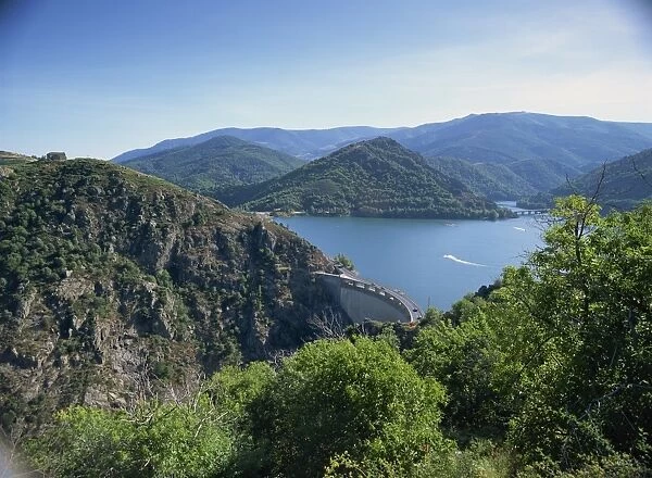 The Cevennes Dam, with the Lac de Villefort and hills in the background