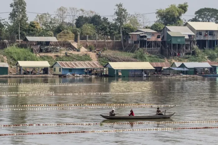 Framed Print : Cham people using a Dai fishing system for trei real fish on the Tonle Sap River Framed Print : Cham people using a Dai fishing system for trei real fish on the Tonle Sap River