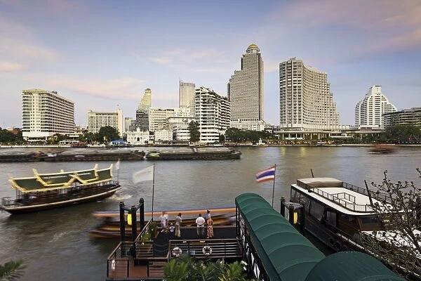 Chao Phraya River and the modern Bangkok skyline, Bangrak district, Bangkok, Thailand, Southeast Asia, Asia