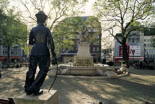 Chaplin statue and Leicester Square, London, England, United Kingdom, Europe