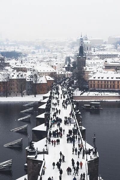 Charles Bridge over the Vltava River in winter, UNESCO World Heritage Site, Prague