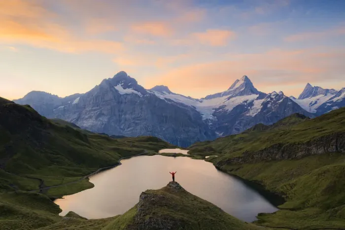 Framed Print : Cheerful hiker admiring Wetterhorn, Schreckhorn and Finsteraarhorn from Bachalpsee Framed Print : Cheerful hiker admiring Wetterhorn, Schreckhorn and Finsteraarhorn from Bachalpsee