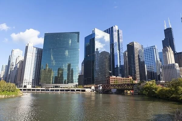 Chicago River and towers including the glass fronted 333 West Wacker Drive which follows the curve of the river, Chicago, Illinois, United States of America, North America