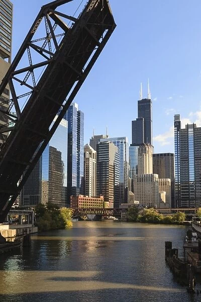 Chicago River and towers of the West Loop area, Willis Tower, formerly Sears Tower in the background, a raised disused railway bridge in the foreground, Chicago, Illinois, United States of America, North America
