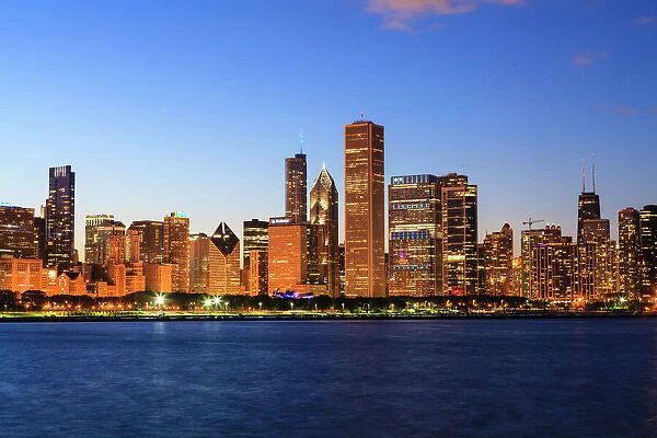 Chicago skyline and Lake Michigan at dusk, Chicago, Illinois, United States of America, North America