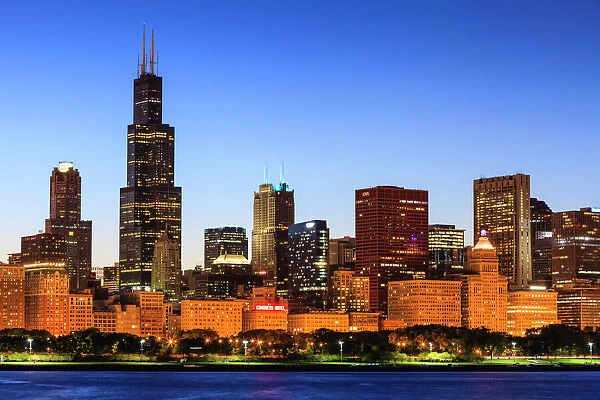 Chicago skyline and Lake Michigan at dusk with the Willis Tower, formerly the Sears Tower, on the left, Chicago, Illinois, United States of America, North America