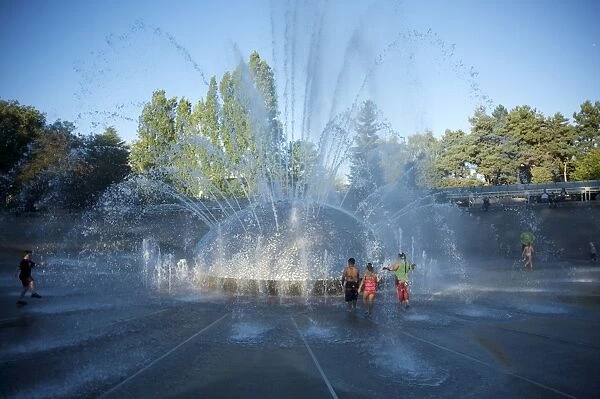 Children play in the fountain at Seattle Center, Seattle, Washington State