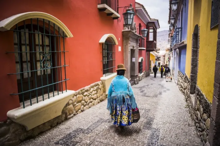 Framed Print : Chollita on Calle Jaen, a colourful colonial cobbled street in La Paz, La Paz Department Framed Print : Chollita on Calle Jaen, a colourful colonial cobbled street in La Paz, La Paz Department