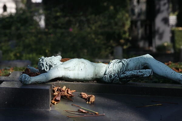 Christ sculpture on gravestone, Paris, Ile de France, France, Europe