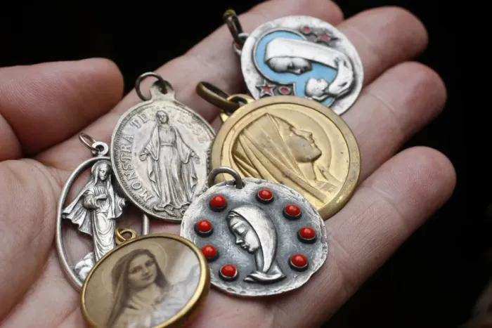 Framed Print : Christian medals, Saint Gervais, Haute Savoie, France, Europe Framed Print : Christian medals, Saint Gervais, Haute Savoie, France, Europe