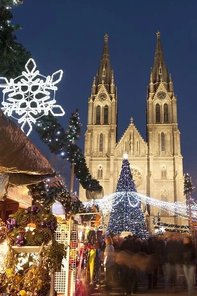 Christmas market and neo-gothic Church of St. Ludmila, Mir Square, Prague, Czech Republic, Europe