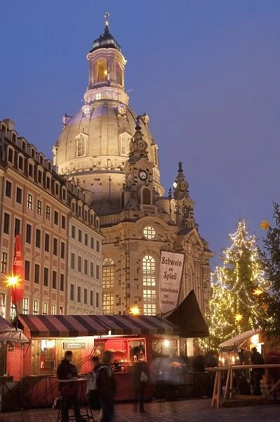 Christmas Market stalls in front of Frauen Church and Christmas tree at twilight