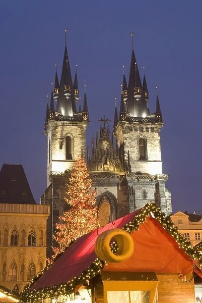 Christmas market at Staromestske (Old Town Square) with Gothic Tyn Cathedral