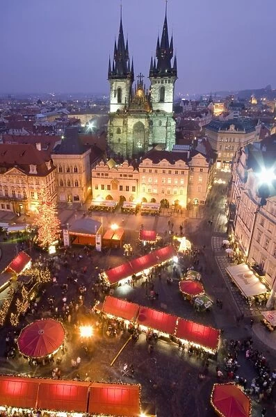 Christmas market at Staromestske (Old Town Square) with Gothic Tyn Cathedral