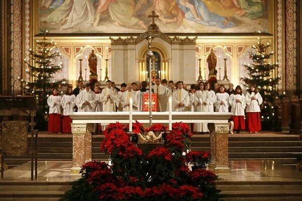 Christmas midnight Mass in Ludwigkirche, Munich, Bavaria, Germany, Europe