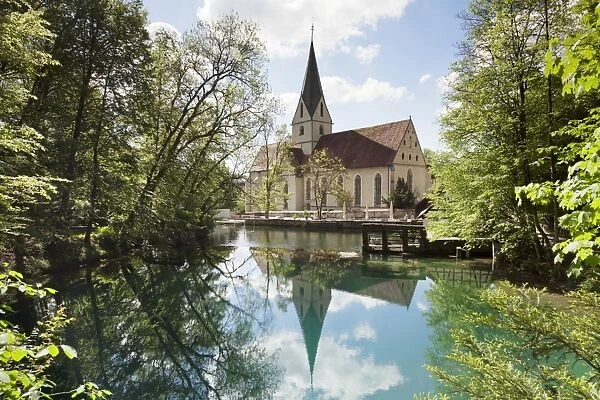 Church of Blaubeuren Monastry reflecting in Blautopf Spring, Blaubeuren, Swabian Alb, Baden Wurttemberg, Germany, Europe