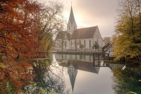 Church of Blaubeuren Monastry reflecting in Blautopf Spring, Blaubeuren, Swabian Alb, Baden Wurttemberg, Germany, Europe