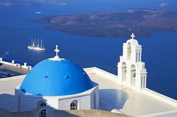 Church with blue dome overlooking the Aegean, Fira, Thira, Santorini, Cyclades, Greek Islands, Greece, Europe