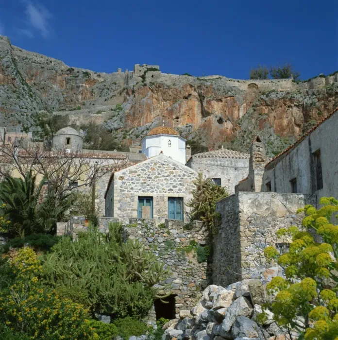 Framed Print : A church with cliffs behind at Monemvasia