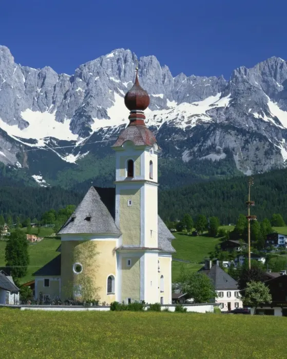 Framed Print : Church with onion dome at Going, with mountains behind, in the Tirol, Austria, Europe Framed Print : Church with onion dome at Going, with mountains behind, in the Tirol, Austria, Europe