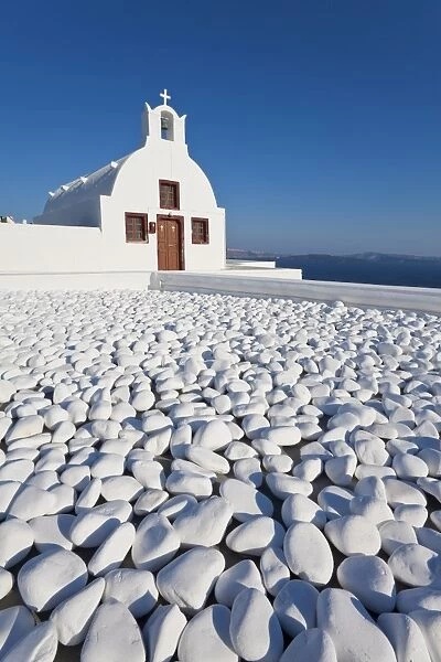 Church overlooking Aegean Sea in the village of Oia, Santorini (Thira)