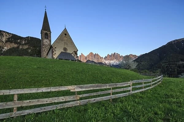 The Church of Ranui and the Odle group in the background, St. Magdalena, Funes Valley