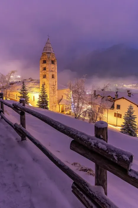 Framed Print : Church of Saint Pantalon and snow covered town centre and mountainous background in winter at dusk, Courmayeur, Aosta Valley, Italian Alps, Italy Framed Print : Church of Saint Pantalon and snow covered town centre and mountainous background in winter at dusk, Courmayeur, Aosta Valley, Italian Alps, Italy