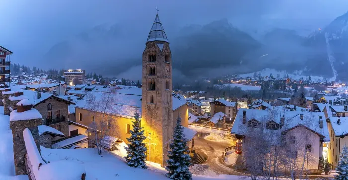 Framed Print : Church of Saint Pantalon, snow covered town centre and mountainous background in winter at dusk, Courmayeur, Aosta Valley, Italian Alps, Italy Framed Print : Church of Saint Pantalon, snow covered town centre and mountainous background in winter at dusk, Courmayeur, Aosta Valley, Italian Alps, Italy